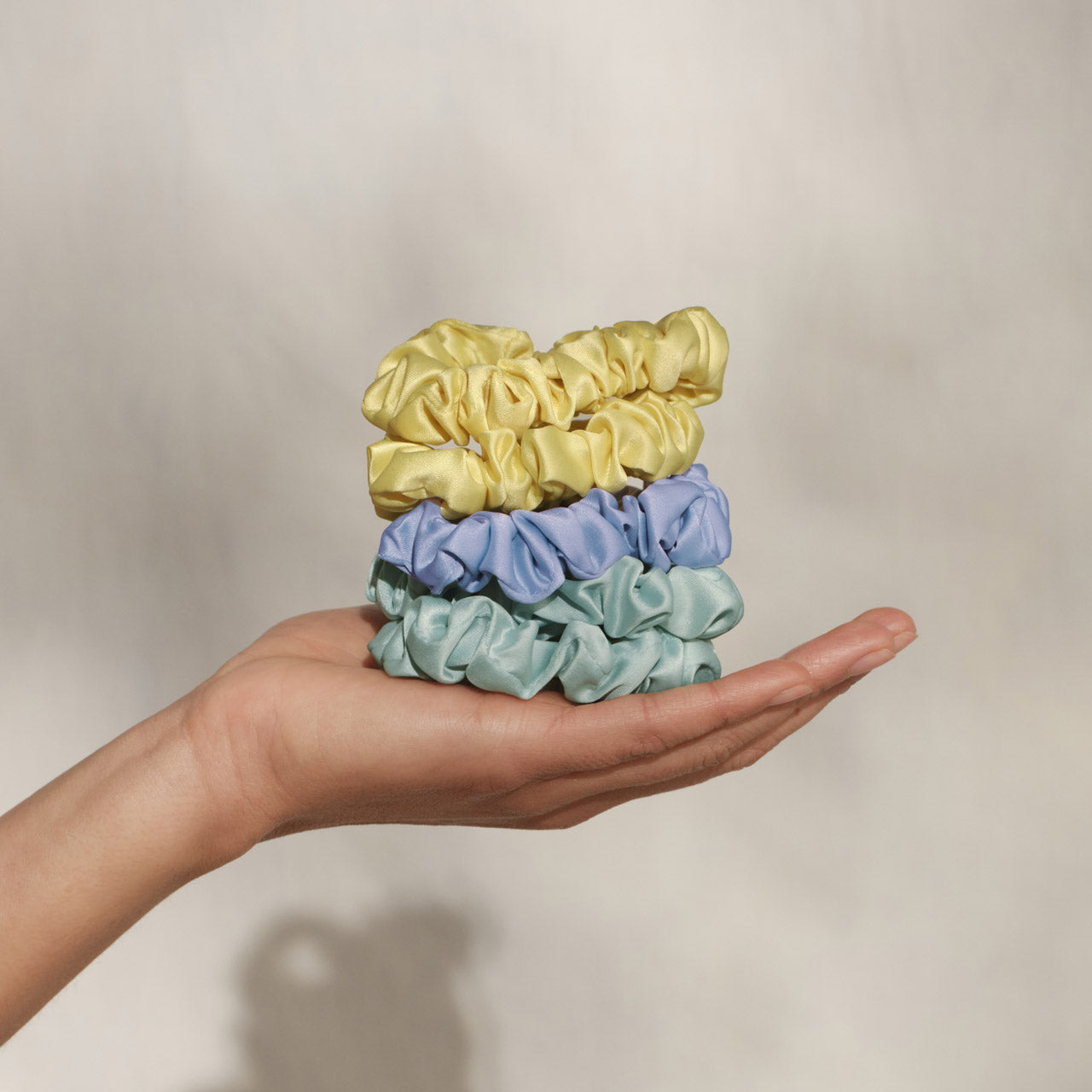 509235-CoastalCottage-RuchedSatinScrunchies-5pc-MultiColor-Model-1280x1280px